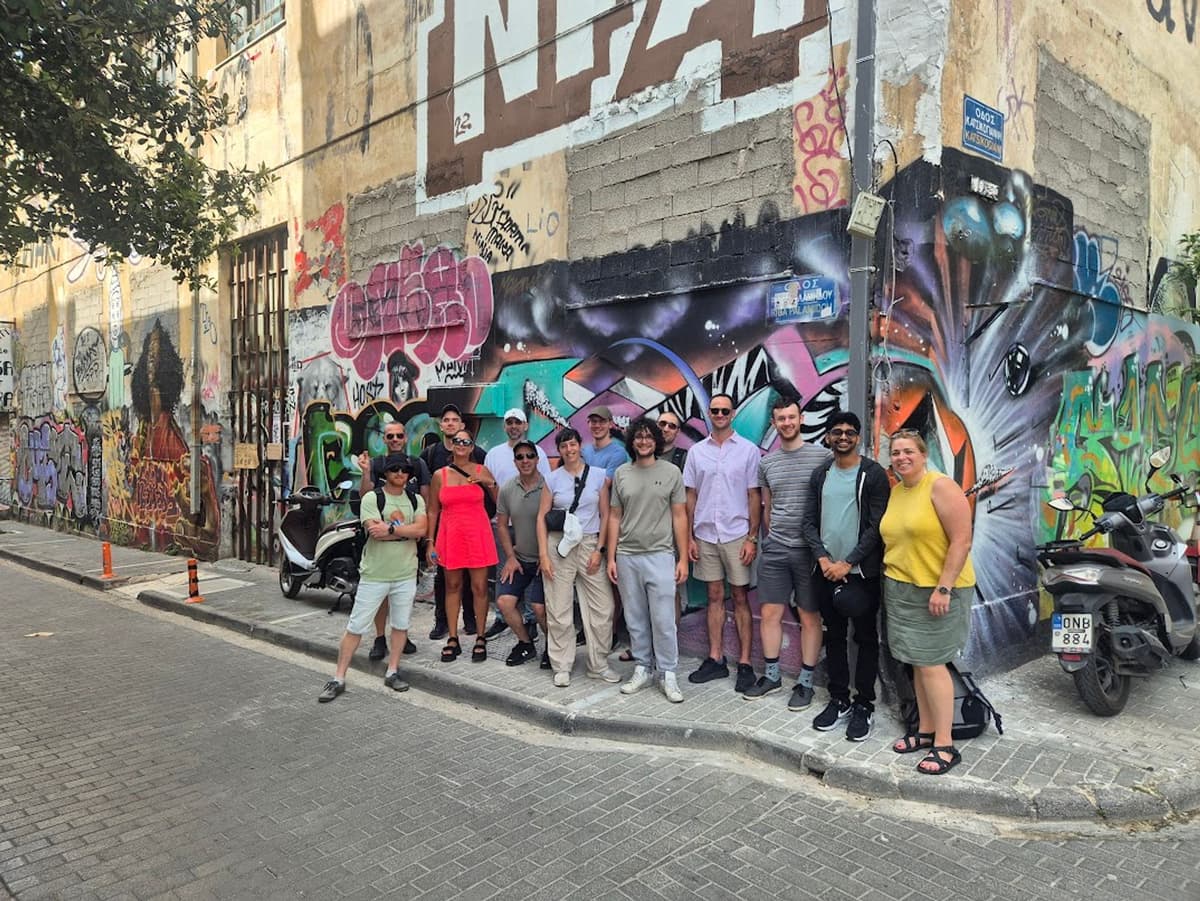 A dragonfly team photo on a street